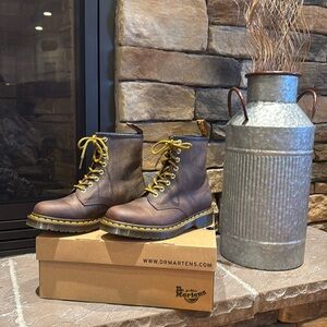 Women’s size US 7/EU 38 Brown Dr. Marten AirWair lace-up boots.